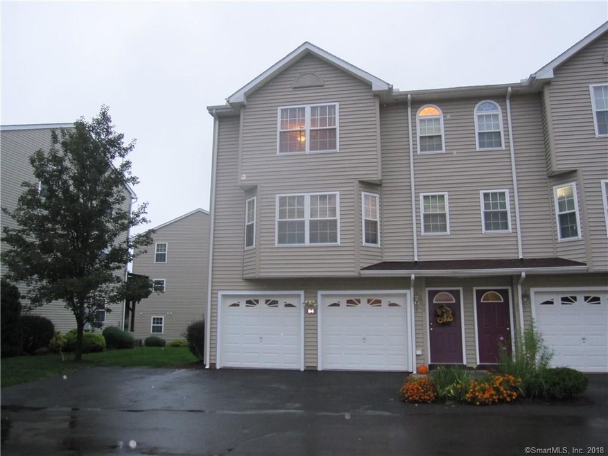 Beautiful end unit in small complex located at the