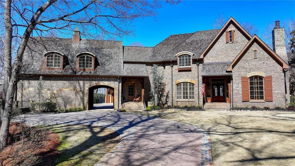 French country style house with a high end roof, d