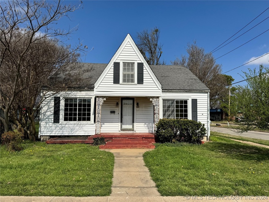 front of home on W Main