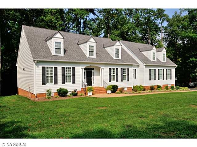 Exterior Front - Custom home on over an acre.