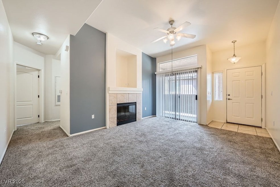 Living Room With Vaulted Ceilings & Fireplace