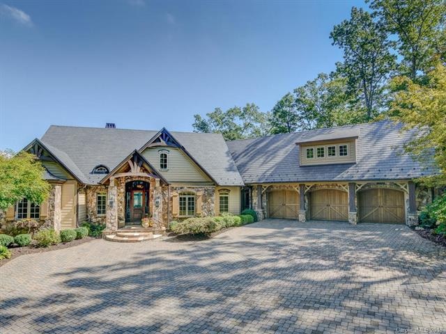 Custom Home with New Slate roof and oversized moto
