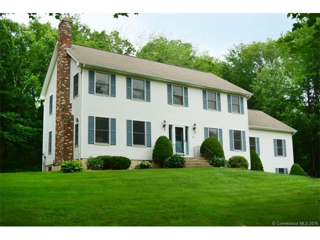 Beautiful Colonial set on a 1.58 acre lot in a des