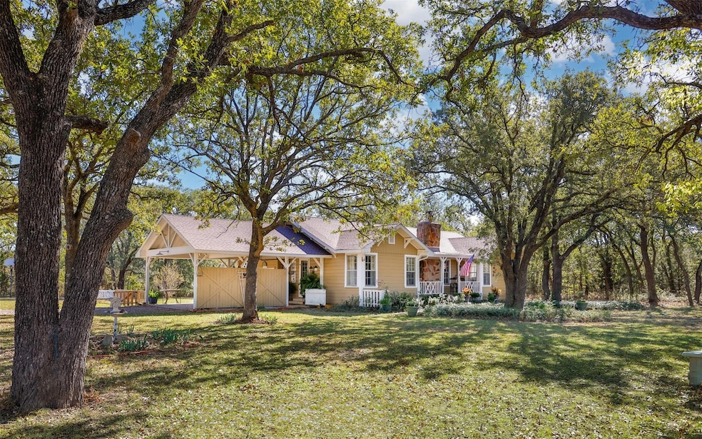 Nestled in the Oaks, you will find this charming 2