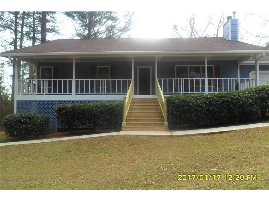 Front view of home with huge front porch. Great cu