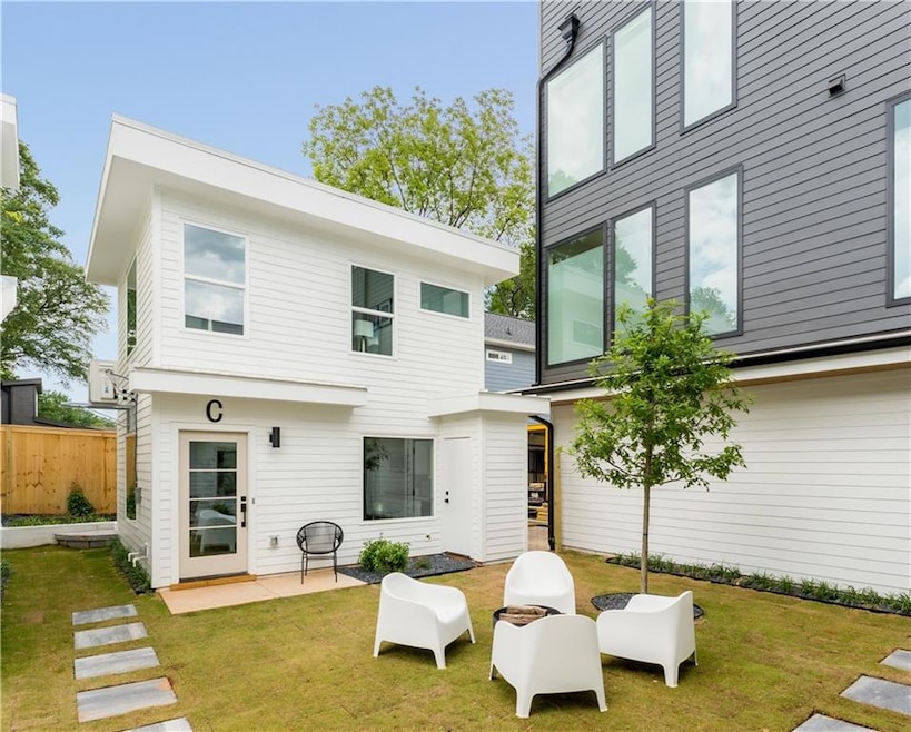 Rear view of house with a patio area