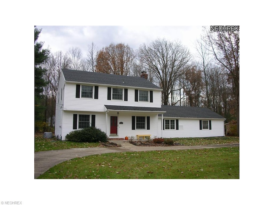 Four bedroom center hall Colonial with circular dr