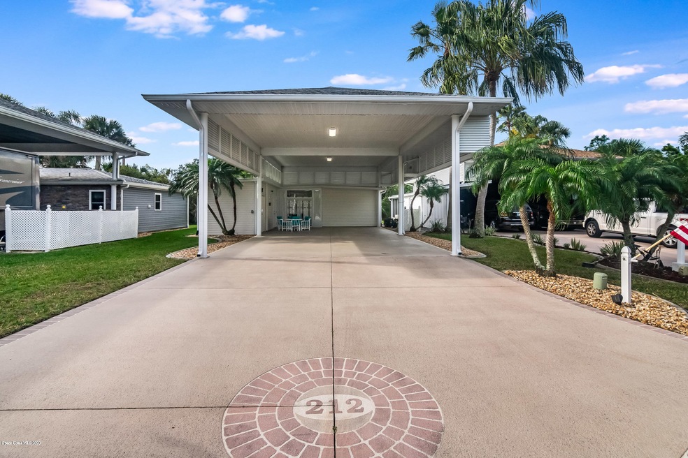 212 Coach Club Dr, Titusville, FL 32780 - photo 1