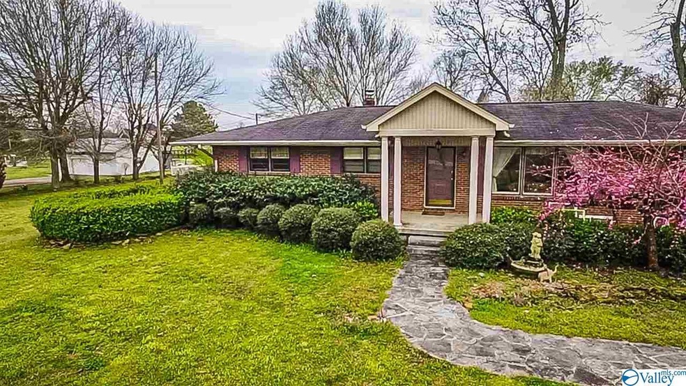 All brick home on 1.1 acres