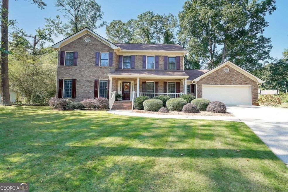 909 Butterfly Ct SW, Lilburn, GA 30047 - photo 1