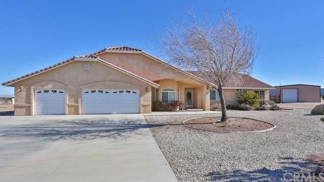 Main Entry to residence, beautiful concrete drivew