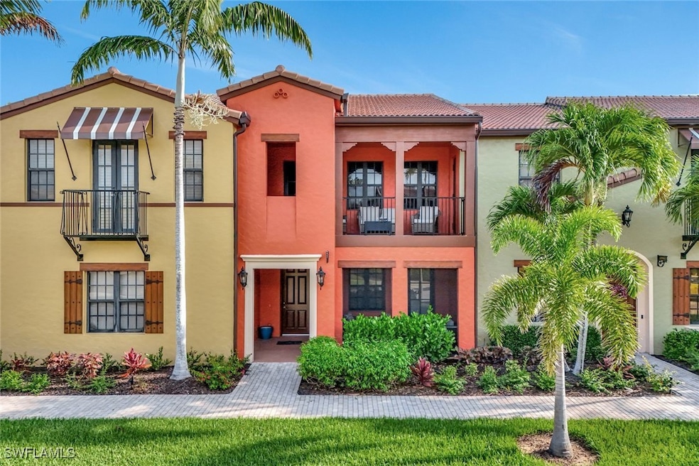 View of front of home with a balcony, stucco sidin