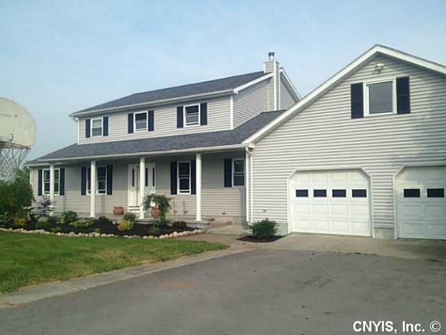Exterior Front. Front view of home showing attache