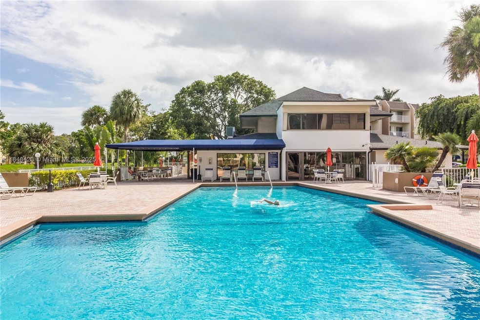 Kings Creek unit F2-404, Miami, FL 33143 - photo 1