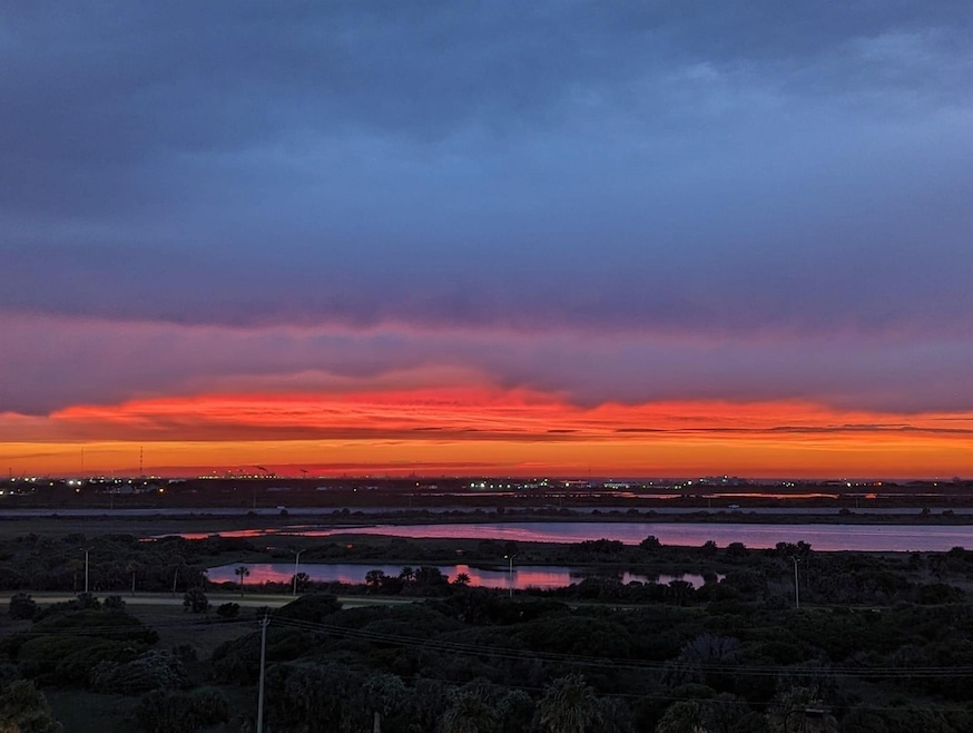 Cotton candy sunsets off the bay front balcony are