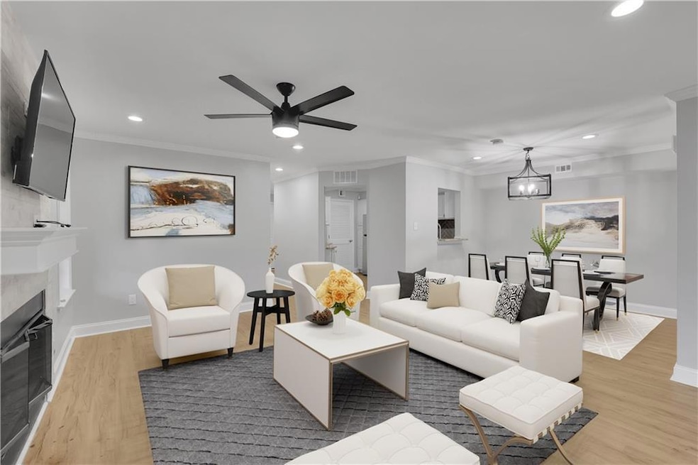 Virtually Staged: Living room featuring ceiling fa