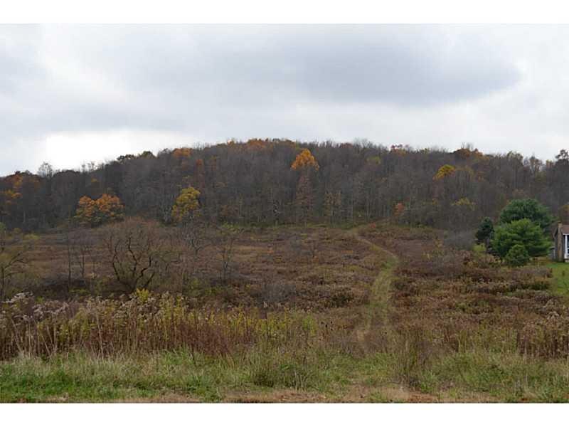 Land. Entrance onto property is shown.