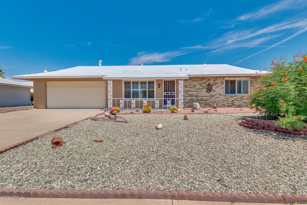 9702 W Mockingbird Dr, Sun City, AZ 85373 - photo 1