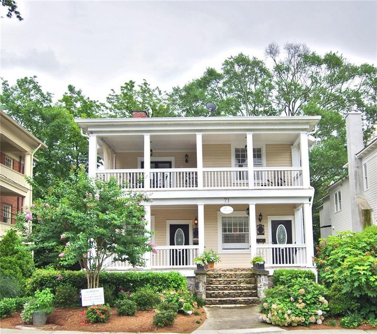 Facade of home - Unit is top floor