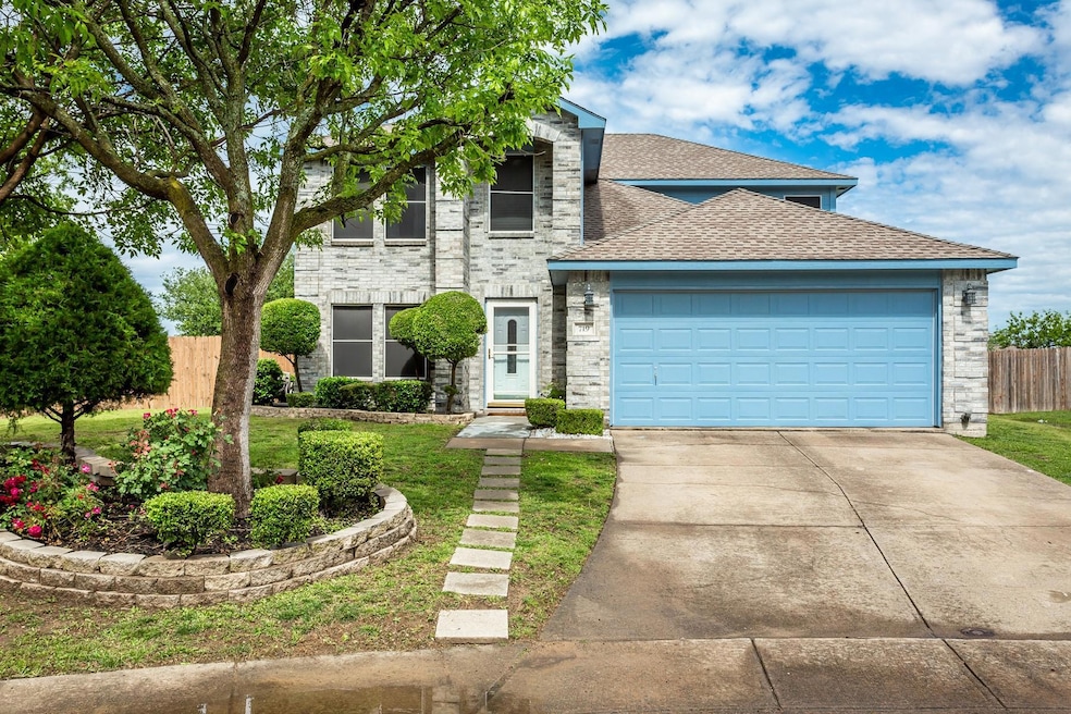 Traditional-style home featuring brick siding, fen
