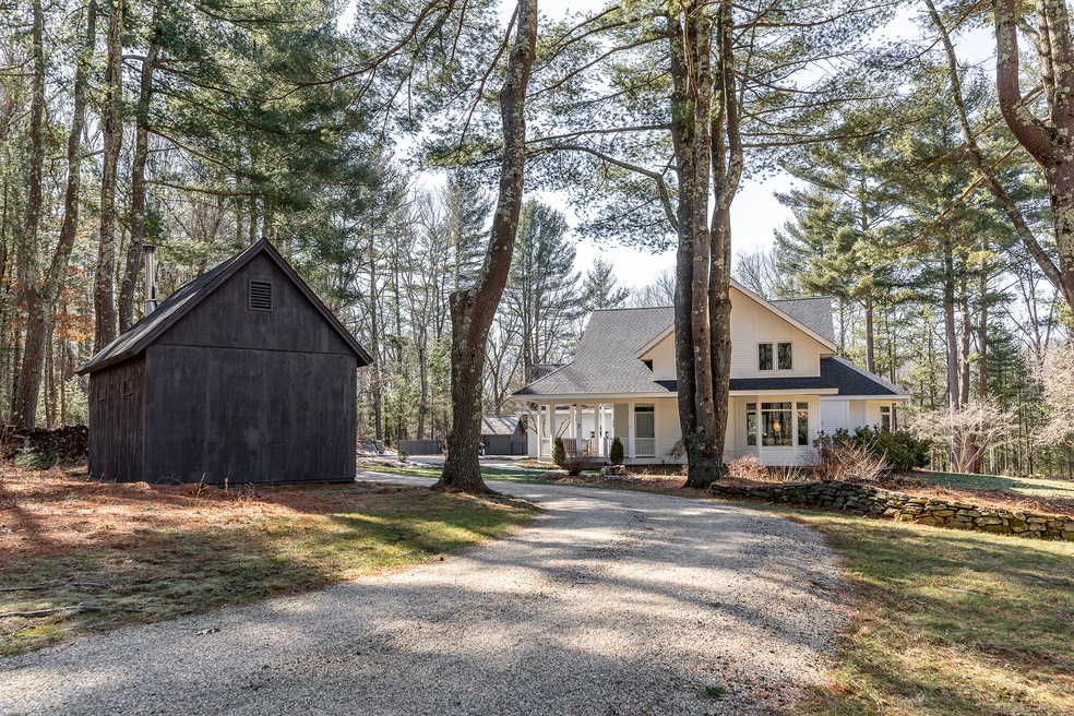 Drive up with Main house and workshop or studio