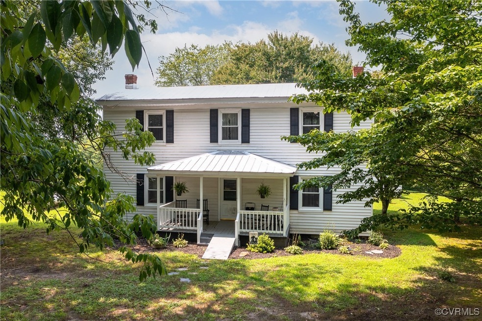 View of front of property with a porch and a front