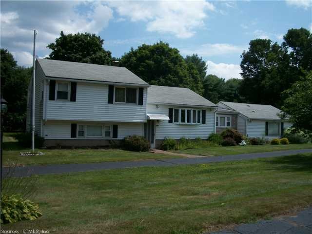 Exterior Front. Nice level corner lot , with circu