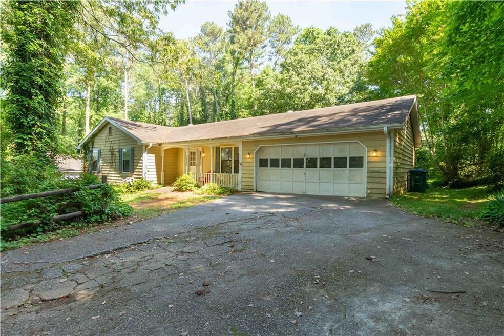 3569 Five Forks Trickum Rd SW, Lilburn, GA 30047 - photo 1