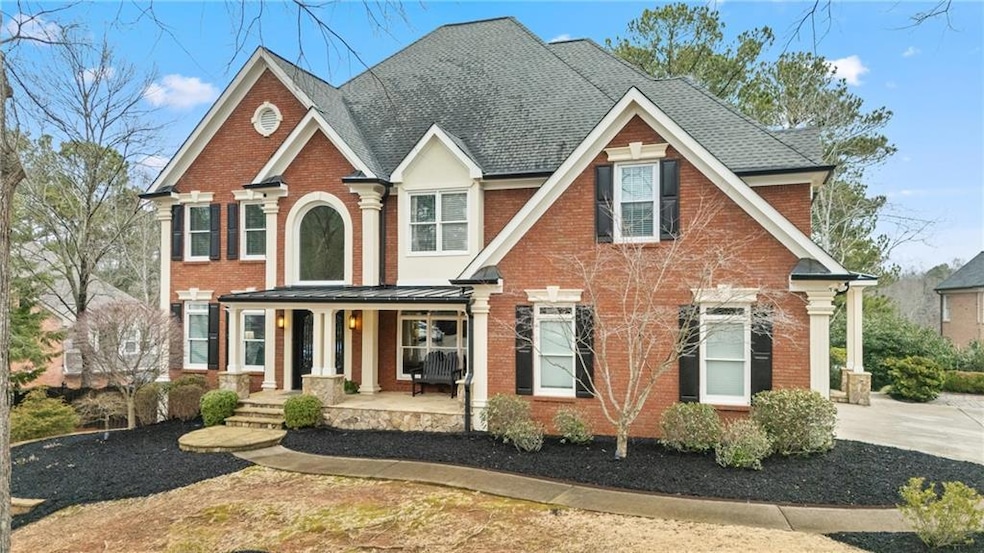 View of front of property featuring covered porch,