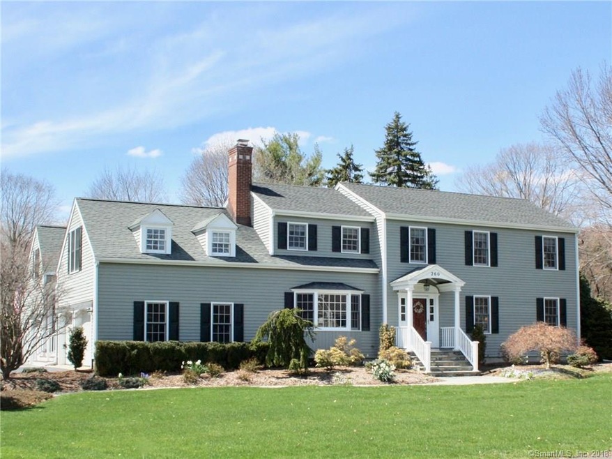 This pristine, 5-bedroom colonial features an open