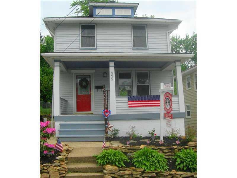 Exterior Front. ROCK GARDEN WITH PERENNIALS MAKE A