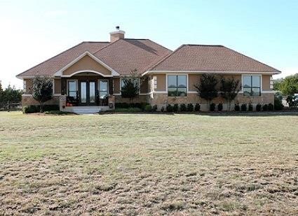 Gorgeous custom built, single story, 4 sided stone and stucco home sitting on 2 acres in gated equestrian community. This stunning home exudes charm, style, and elegance. The home has dimensional shingles, ridge vents, and Low-e windows.