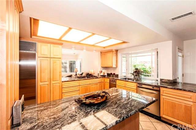 This kitchen has top of the line appliances, grani