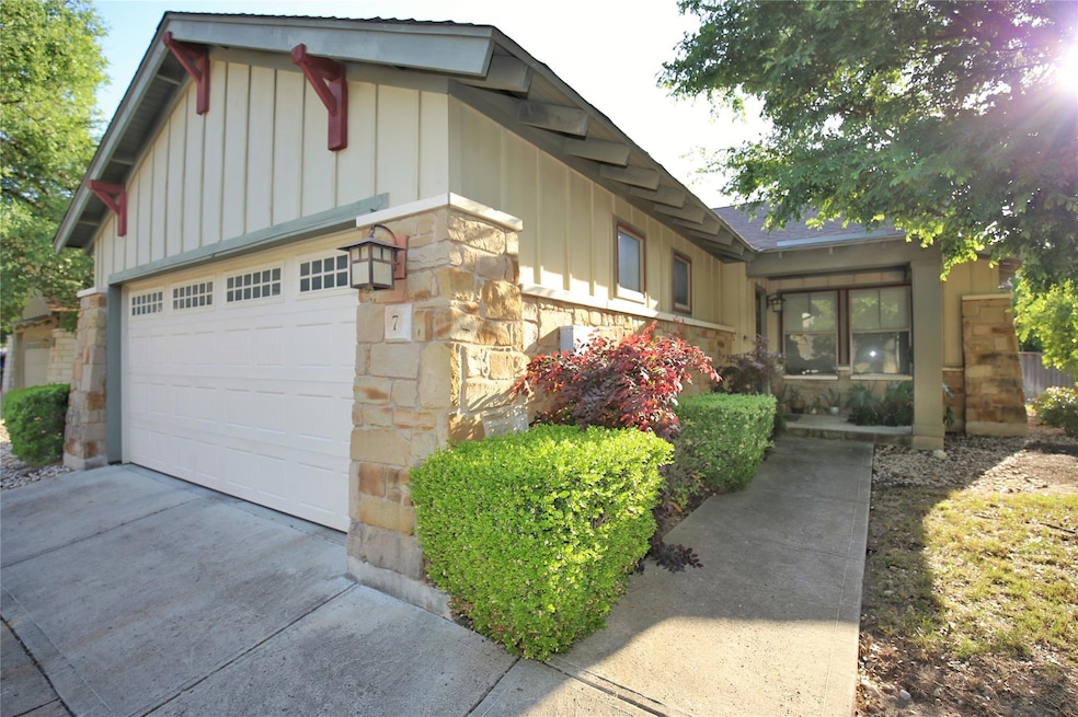 View of property exterior with board and batten s