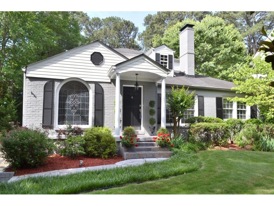 Charming 4 bedroom 2.5 bath with lush lanscape and
