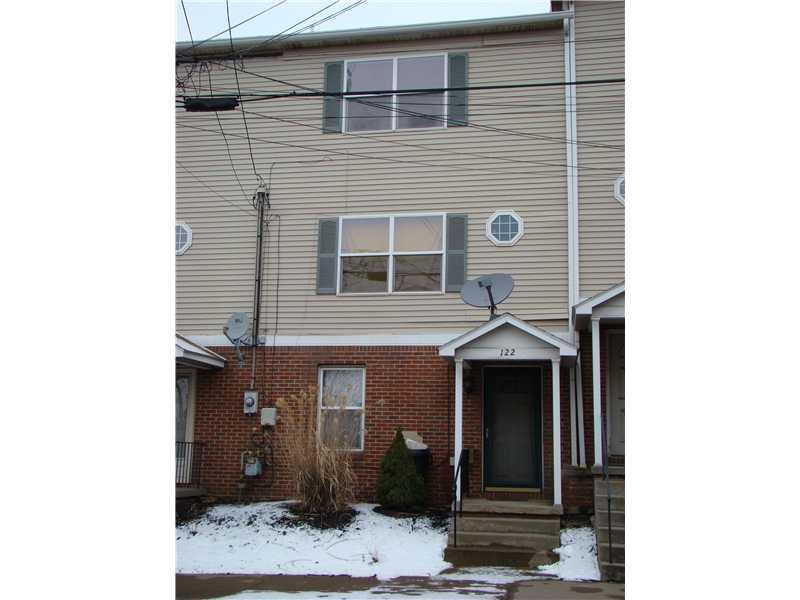 Exterior Front. SPACIOUS TOWNHOUSE WITH MANY UPGRA