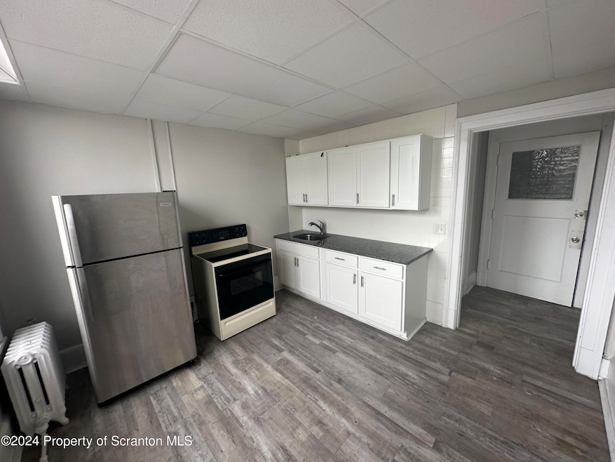 102 Delaware Ave unit 3E, Olyphant, PA 18447 - photo 1