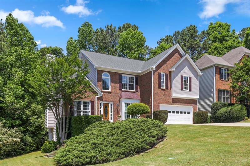 Amazing move in ready home in popular Swim/Tennis community in Johns Creek! Fresh Paint Inside and Out!