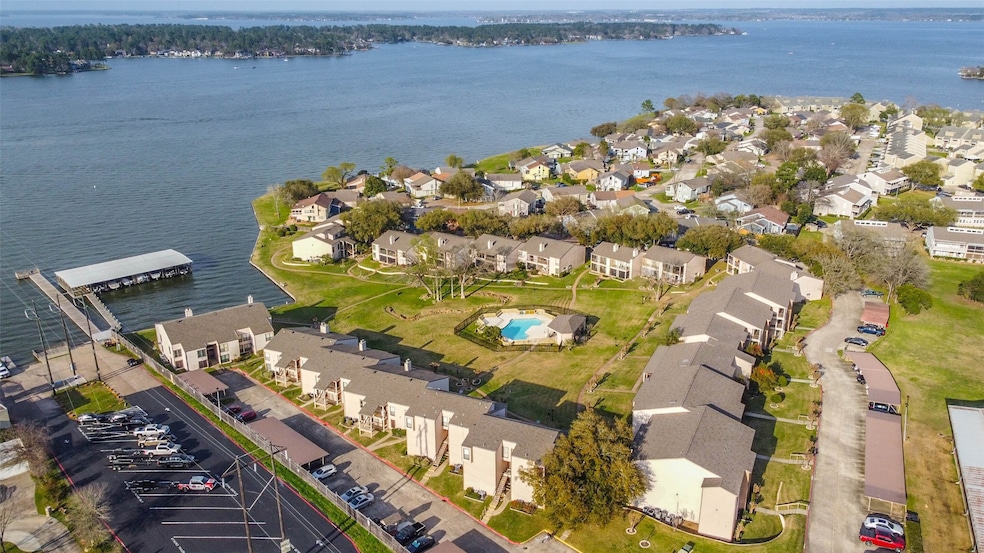 This aerial photo showcases a picturesque lakeside