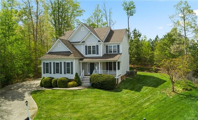 Enjoy the view from your half-wrap front porch as you sip on your morning coffee!