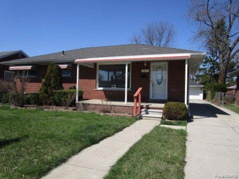 Full brick ranch with covered front p