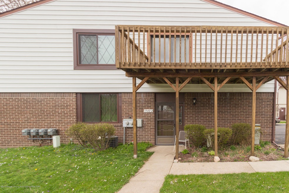 3940 Hunters Ridge Dr unit 2, Lansing, MI 48911 - photo 1