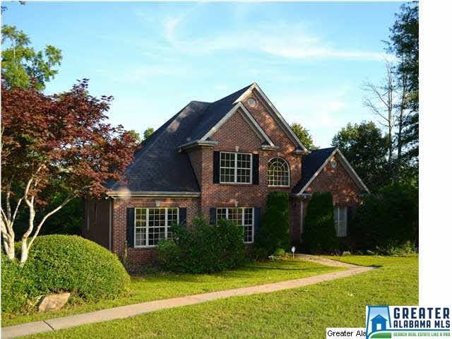 Gorgeous brick four bedroom home in The Woodlands.