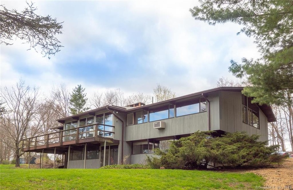 This 10 room Deck House is conveniently located, c