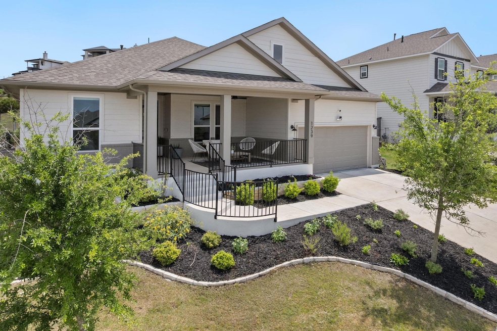 View of front of property featuring an attached g