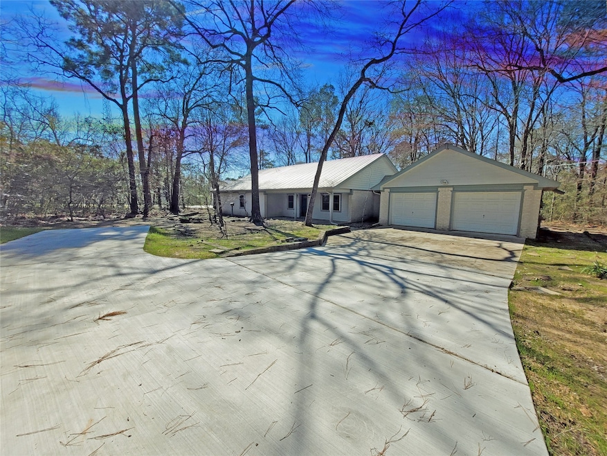 Welcoming entrance with ample parking space.