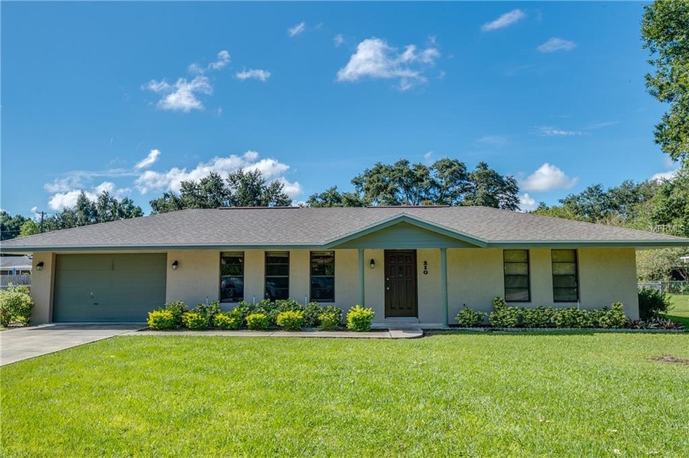Front view which shows large front yard