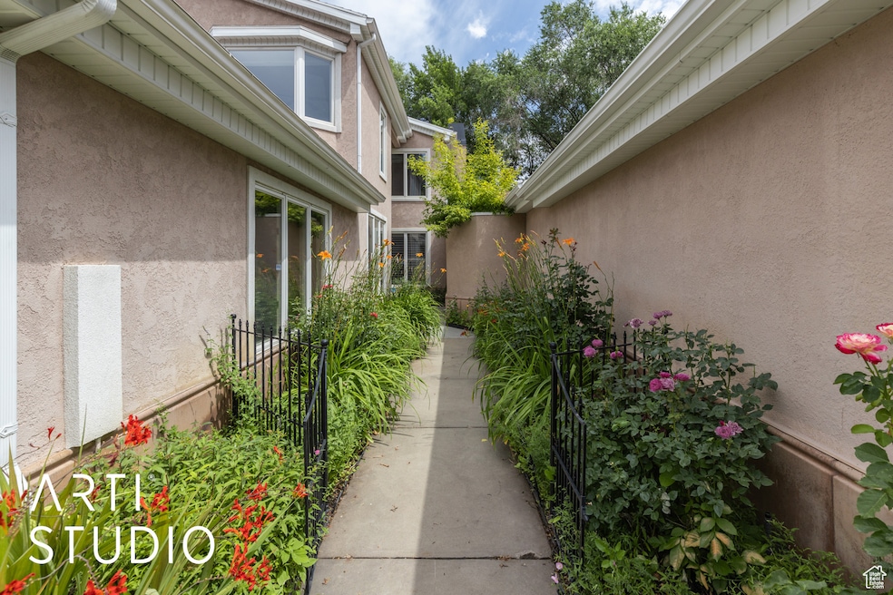 Property entrance featuring stucco siding