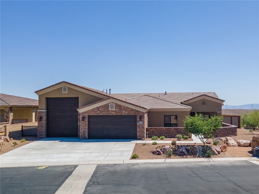Single story home featuring  2-car garage with RV