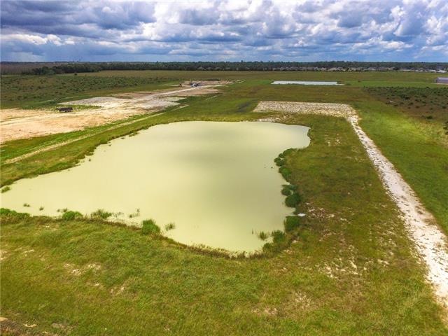2 acre pond and driveway to house pad.